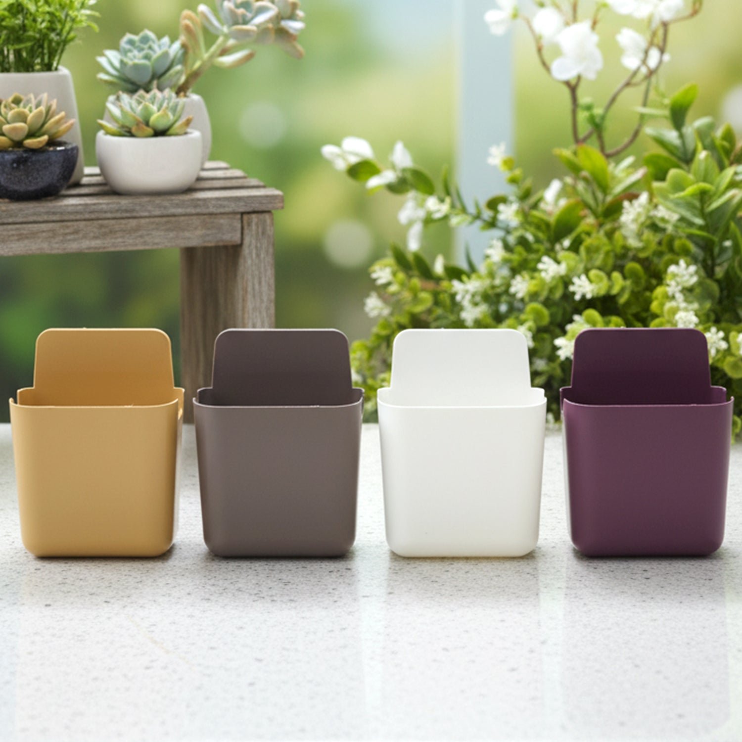 02_07c5e7da-2fef-4d6c-bda0-38a9de4aea00.jpg Multipurpose Plastic Wall Mounted Remote & Mobile Holder Stand – (Pack of 4 / Mix Color) - Image 1