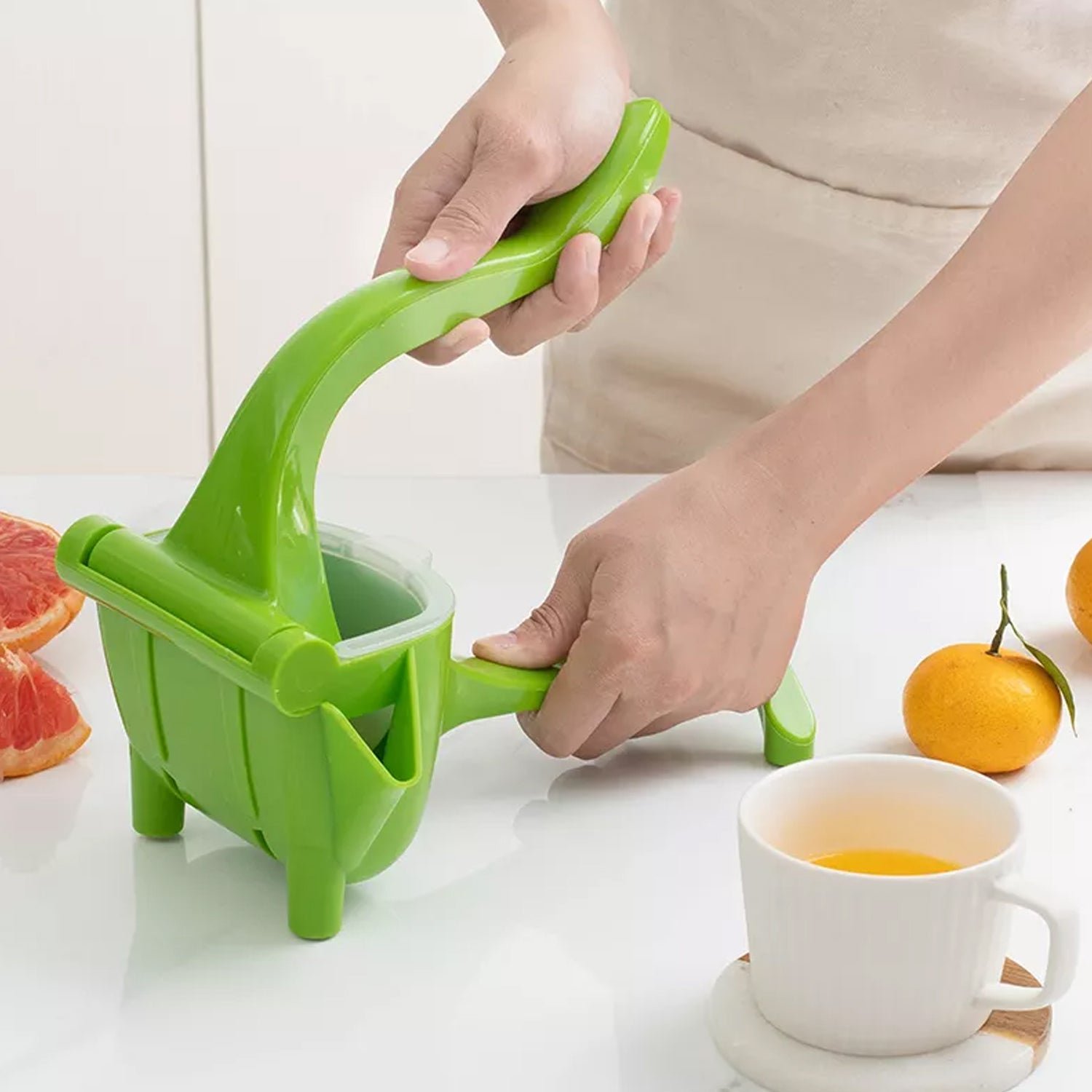 02_399e8427-38e3-494e-a97c-46daf8912776.jpg Manual Plastic Fruit Juicer, Hand Juicer Extractor Tool for Orange, Limes - Image 1