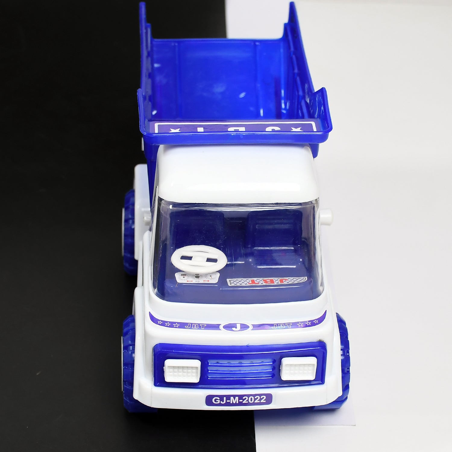 03_9aaf58ea-a295-4905-87bc-20ce4eeb3a8b.jpg Big Friction Powered Dumper Truck Toy for Kids - Image 1