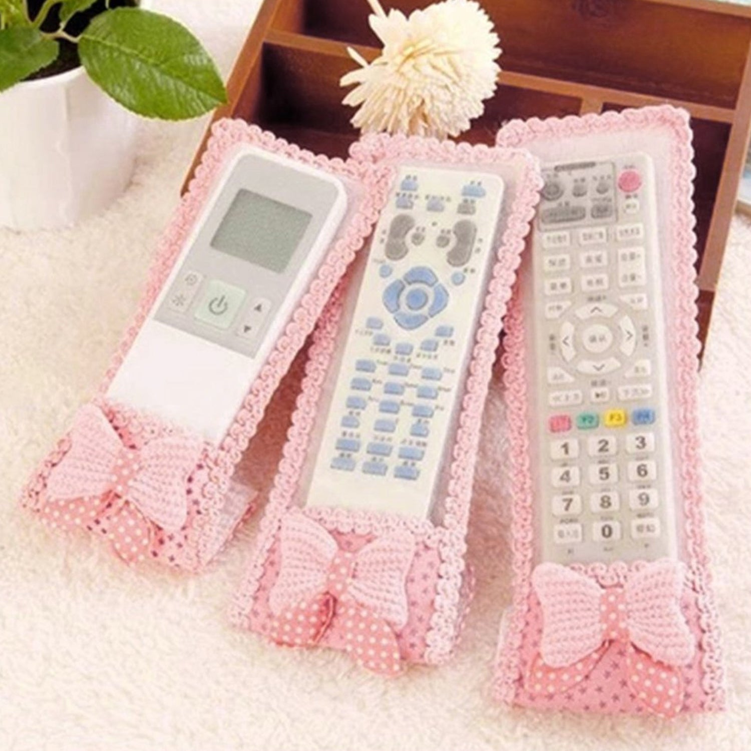 08_4668fb53-9e4e-4f88-bb0c-3f12ed0b34a7.jpg 3pc Remote Cover for TV, AC, DTH – Dust Covers (Mix Design / 3 Pc) - Image 1
