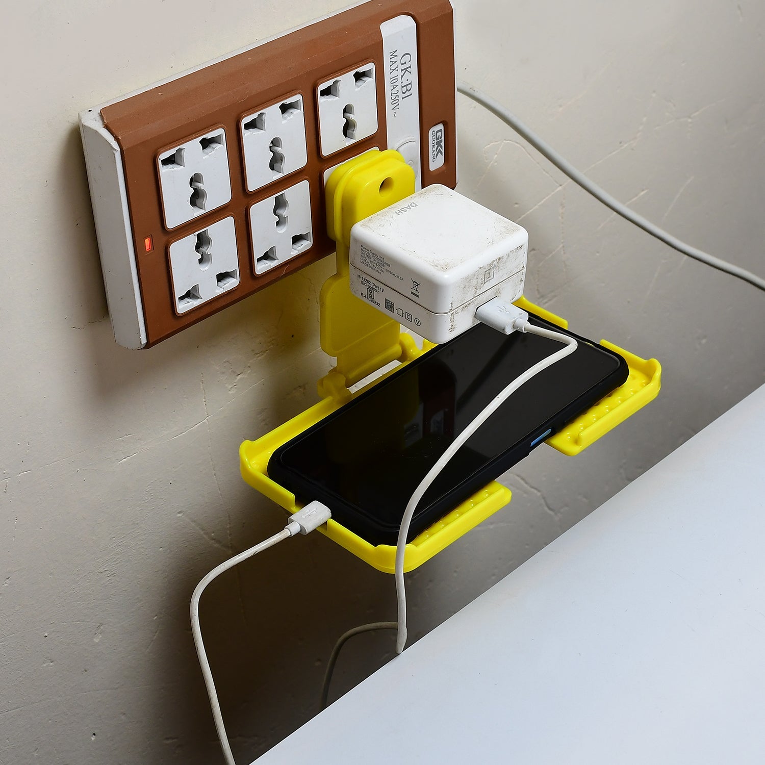 34_e0cd29ea-b437-464e-ace7-08b492160bfc.jpg Multi-Purpose Yellow Wall Holder Stand for Mobile Charging - Image 1