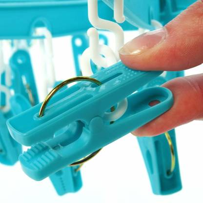 360-degree-18-clip-round-plastic-laundry-clothesline-hanging-original-imafcut3zbhhejfz.jpg Plastic Round Cloth Drying Stand Hanger with 18 Clips (Multicolour) - Image 1