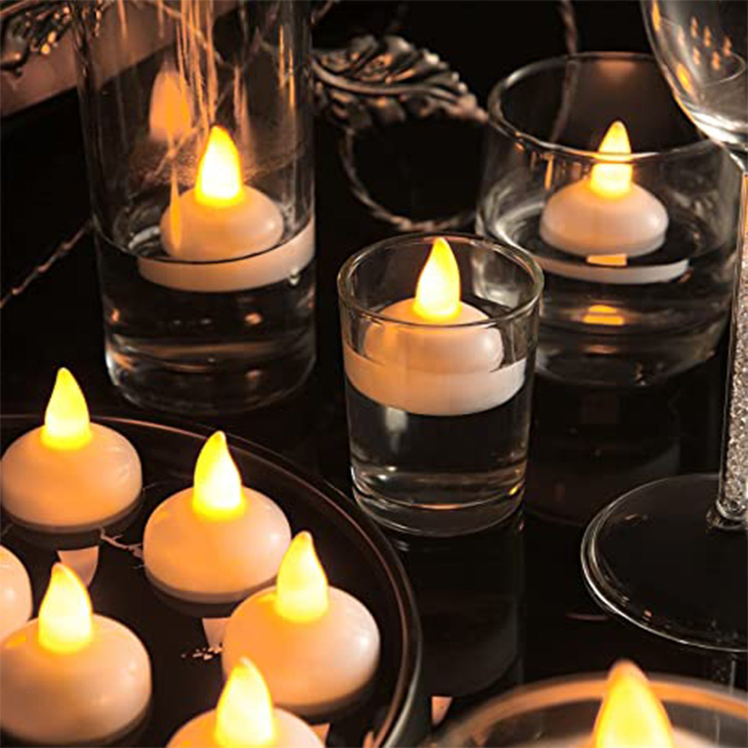 5_e880ec7e-e822-4dc9-9958-cbea8c2b6081.jpg Flameless Floating Tea Light Candles – Battery Operated Set of 8 in Box - Image 1