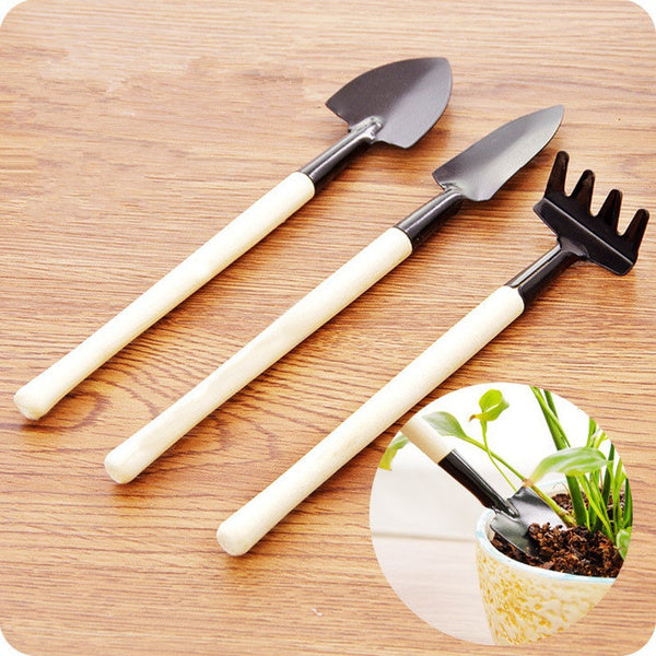 602ec930ce9510f7d3032e61-large_34149799-c982-431c-b9ba-13b01a7f0d5b.jpg Kid's Garden Tools Set of 3 Pieces (Trowel, Shovel, Rake) - Image 1