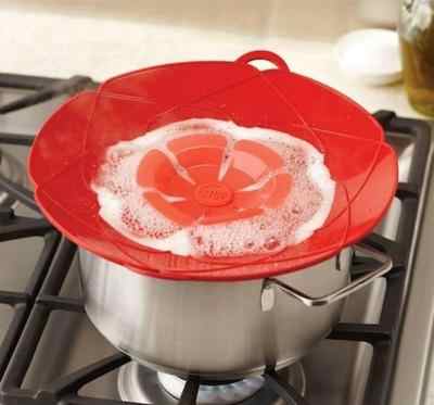 Silicone-lid-Spill-Stopper-Cover-For-Pot-Pan-Kitchen-Accessories-Safeguard-Lid-Multi-Function-Cooking-Tools.jpg_q50.jpg Multifunctional Silicone Lid Cover for Pots and Pans - Image 1